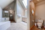 Private master bathroom on the upper level